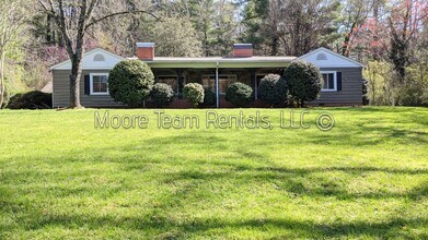 Building Photo - Spacious House - Private Wooded Setting