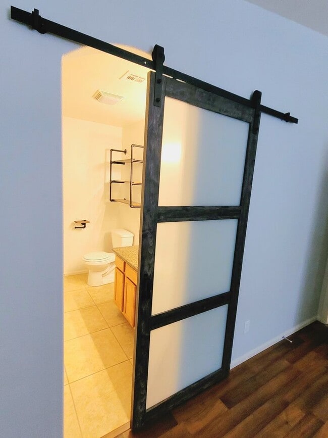 Building Photo - Modern Open Concept 3 Bedroom 2 Bath with Solar.