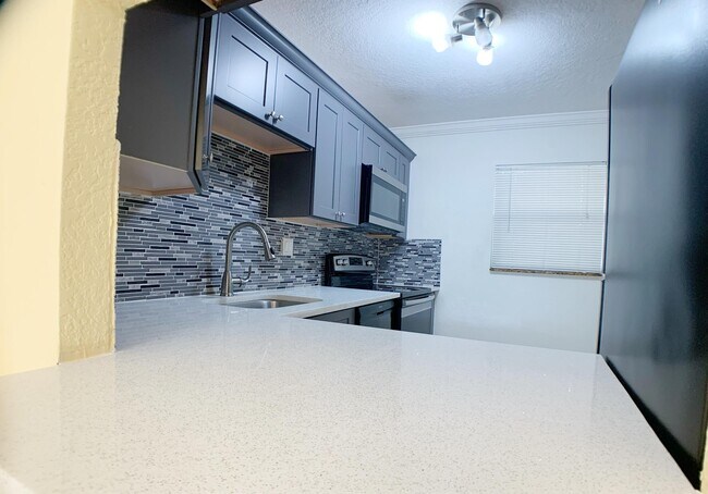 Building Photo - 8370 Sands Point Blvd