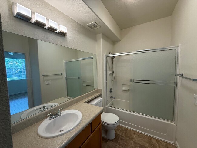 Building Photo - 2 bed | 2bath | 1039 SF | Private Garage & Assigned Parking | Downstairs unit |Owners pays for WS&G!