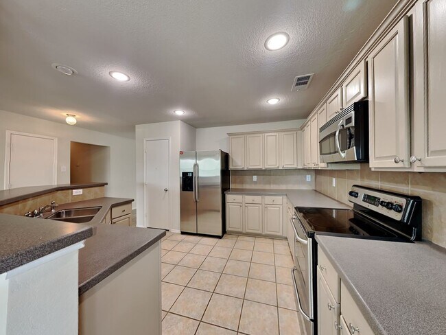 Building Photo - Liberty Crossing Beauty with Space to Spare, a Gameroom to Love & Entertaining Made Easy!