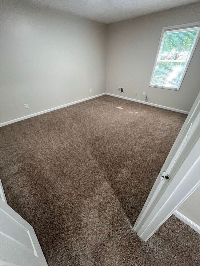 Building Photo - Lawrenceville 2 bedroom Townhome now ready!