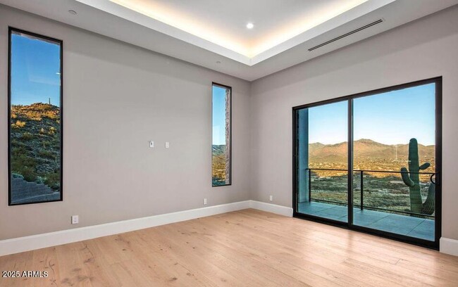 Building Photo - 4880 E Lone Mountain Rd N