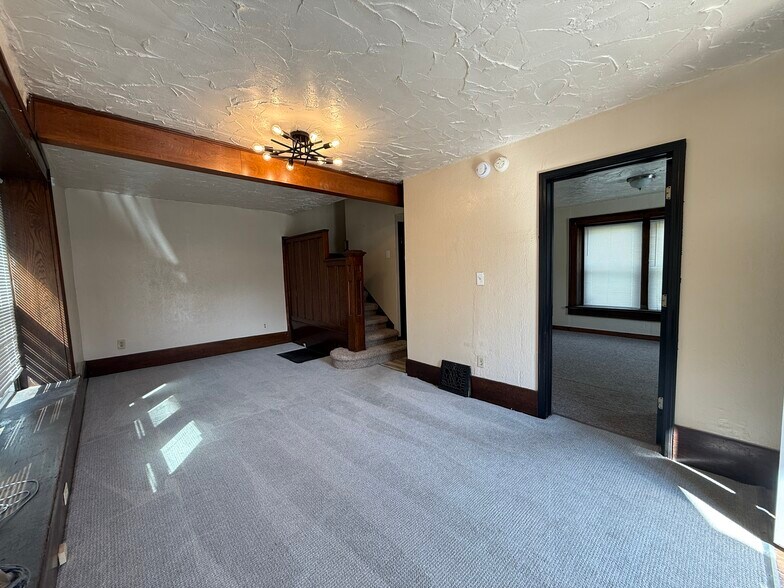 Living/Dining and Main Floor Bedroom - 339 Power St