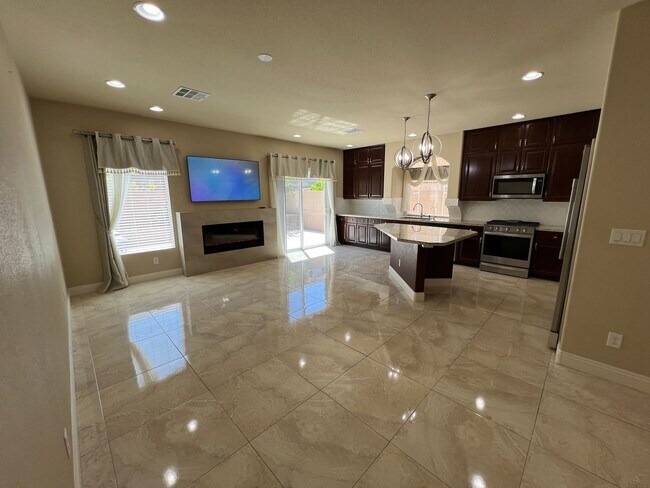 Building Photo - A Fantastic 4 Bedroom Home with the primary Downstairs, in Silverado Ranch