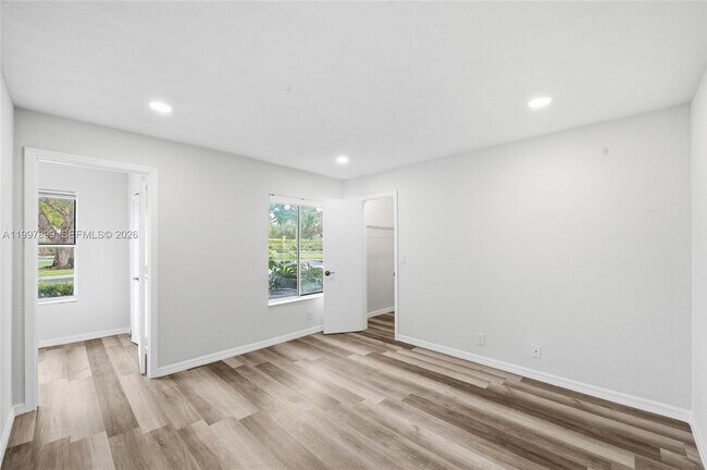 Building Photo - 3310 Pinewalk Dr N