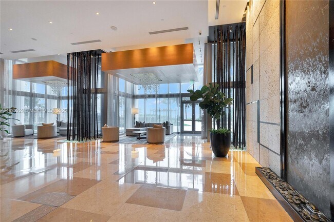 Building Photo - 6899 Collins Ave