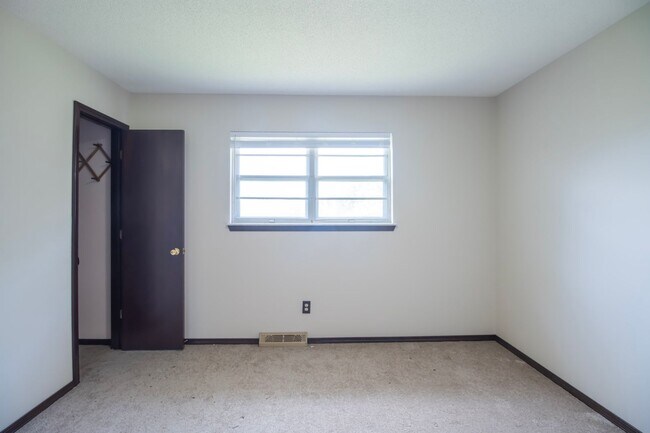 Building Photo - Charming 3BR Home-Screened Porch, Private Garage & Massive Backyard