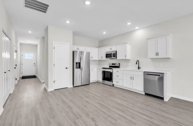 Building Photo - "Discover the Exciting New Developments: Deerfield Duplexes and Townhouses Arriving in 2026!