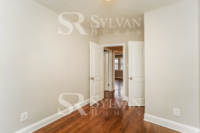 Building Photo - Welcome to this charming abode.