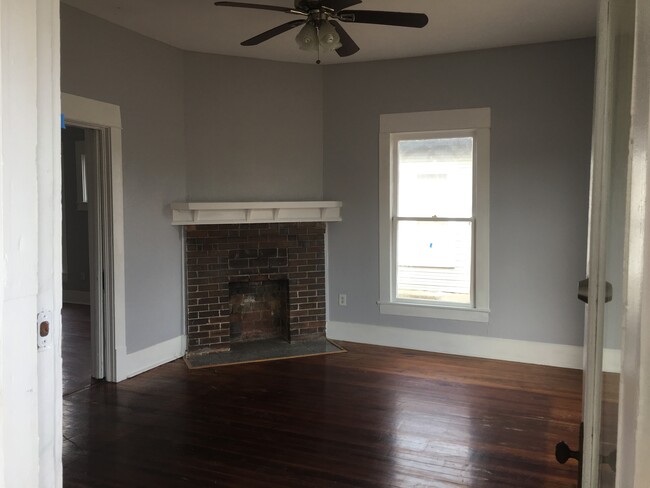 Living room with ornamental fireplace - 1416 5th Ave