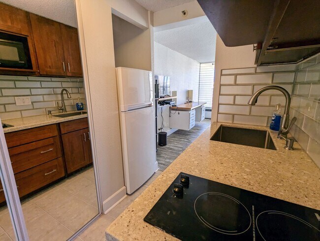 Building Photo - Partially Furnished  Studio with 1-Bath at...