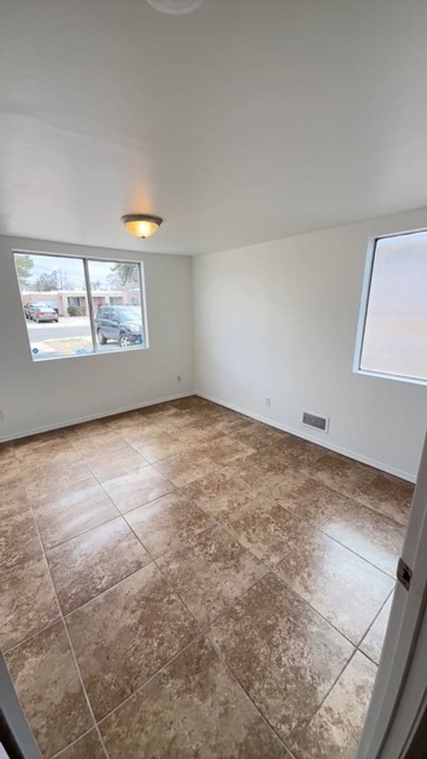 Building Photo - Centrally located in the NE Heights 4 bedroom, 1 3/4 Bath 1900 square feet.