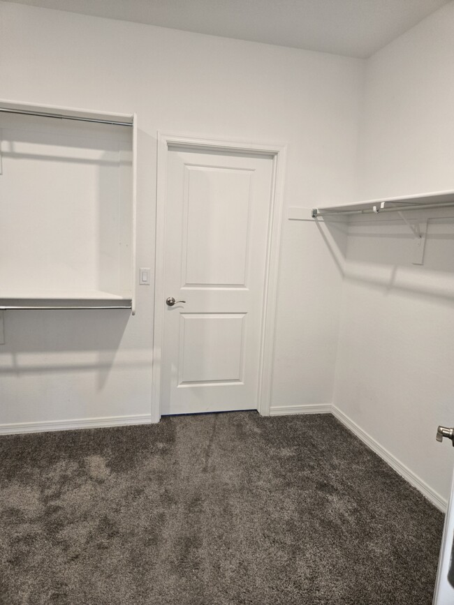 Master walk-in closet - 19975 W Glenrosa Ave