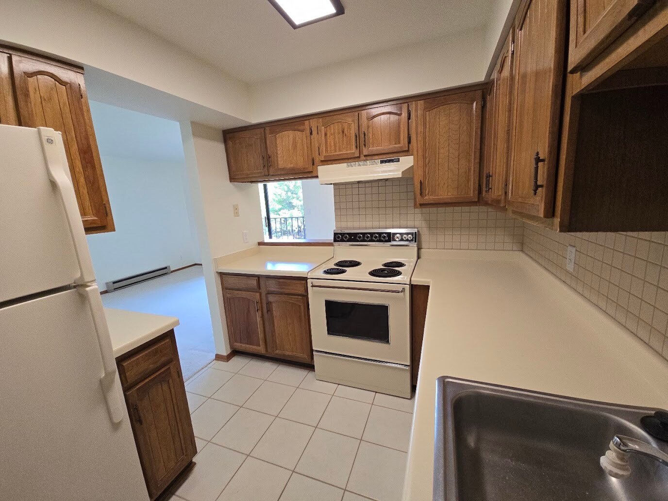 Kitchen View into Livingroom - W177N9731 Riversbend Cir E