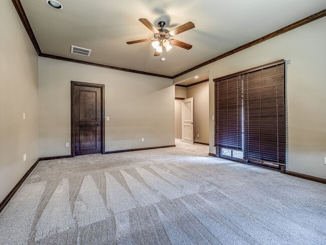 Building Photo - Luxury Edmond Townhome Overlooking Waterfa...