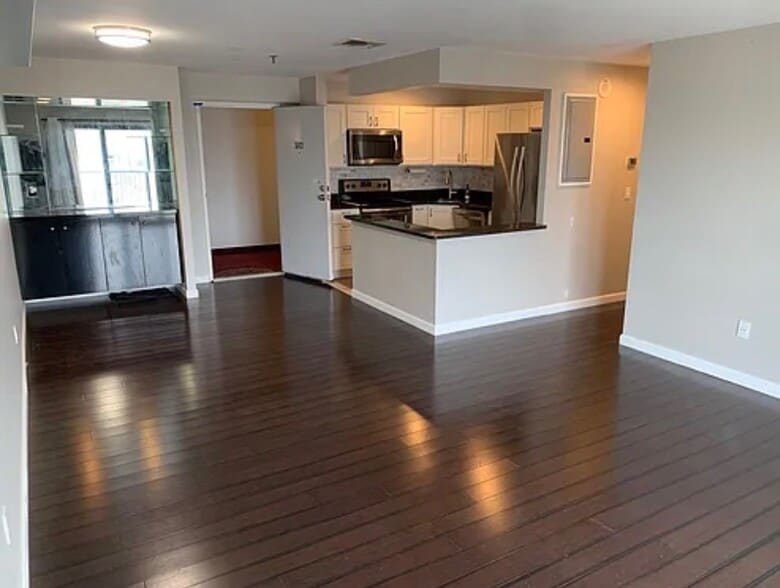 Main living space (open concept combining living room, dining room, kitchen, bar) - 500 Washington St
