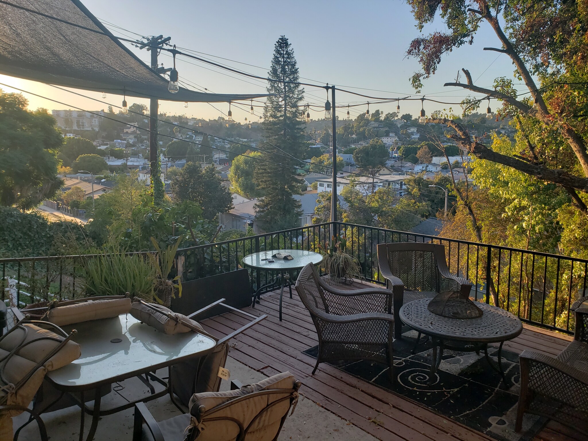 Shared patio area featuring scenic hillside views. - 4966 Twining St