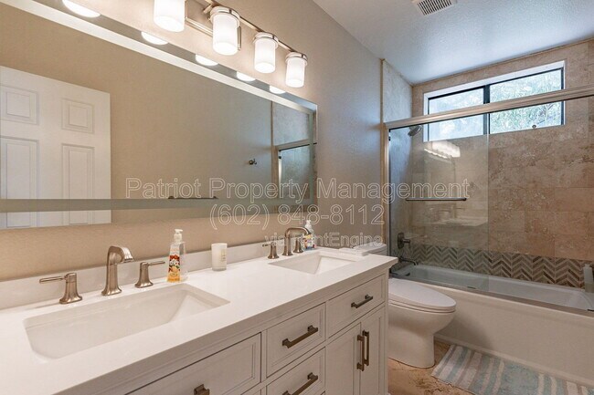 Building Photo - 9910 E Sutton Dr