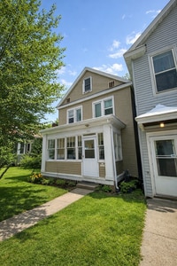 Building Photo - AVAILABLE JUNE 1ST -  Huge 4 Story Hillside Home!