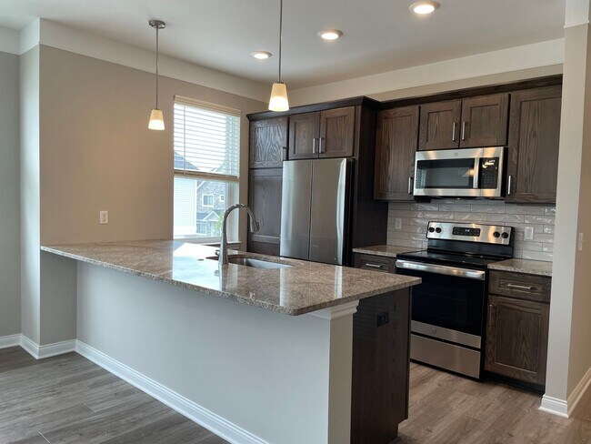 Building Photo - Shelby Township - 3 Bedroom, 2 Bath, End-Unit condo style w/Att Garage