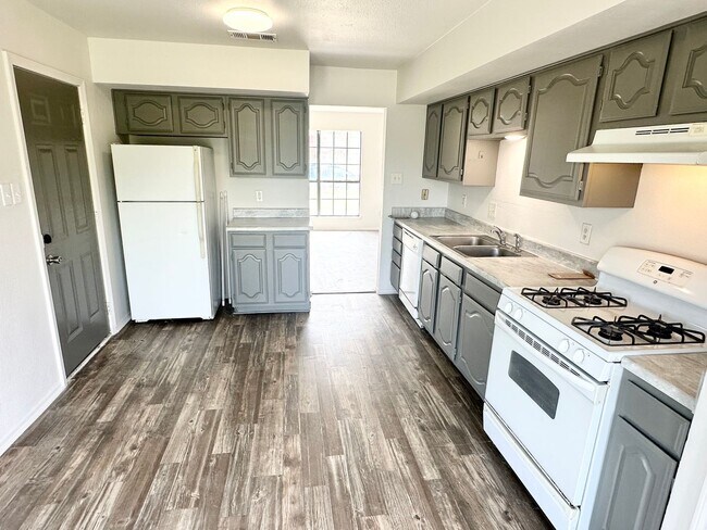 Building Photo - NEW IN MANAGEMENT - AVAILABLE NOW!