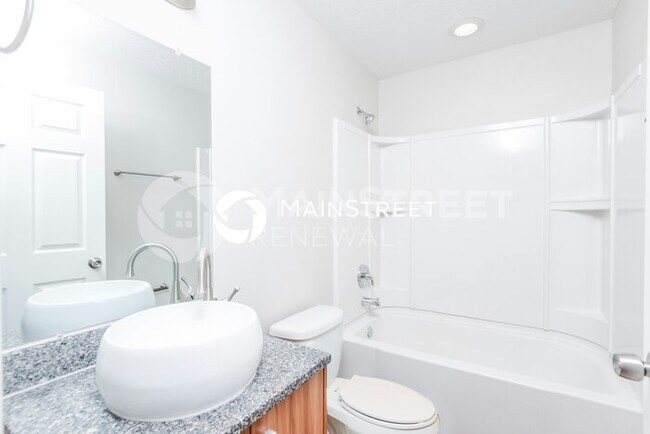 Building Photo - 4 Bedroom Pet-Friendly Home in PALM BAY, FL with Main Street Renewal