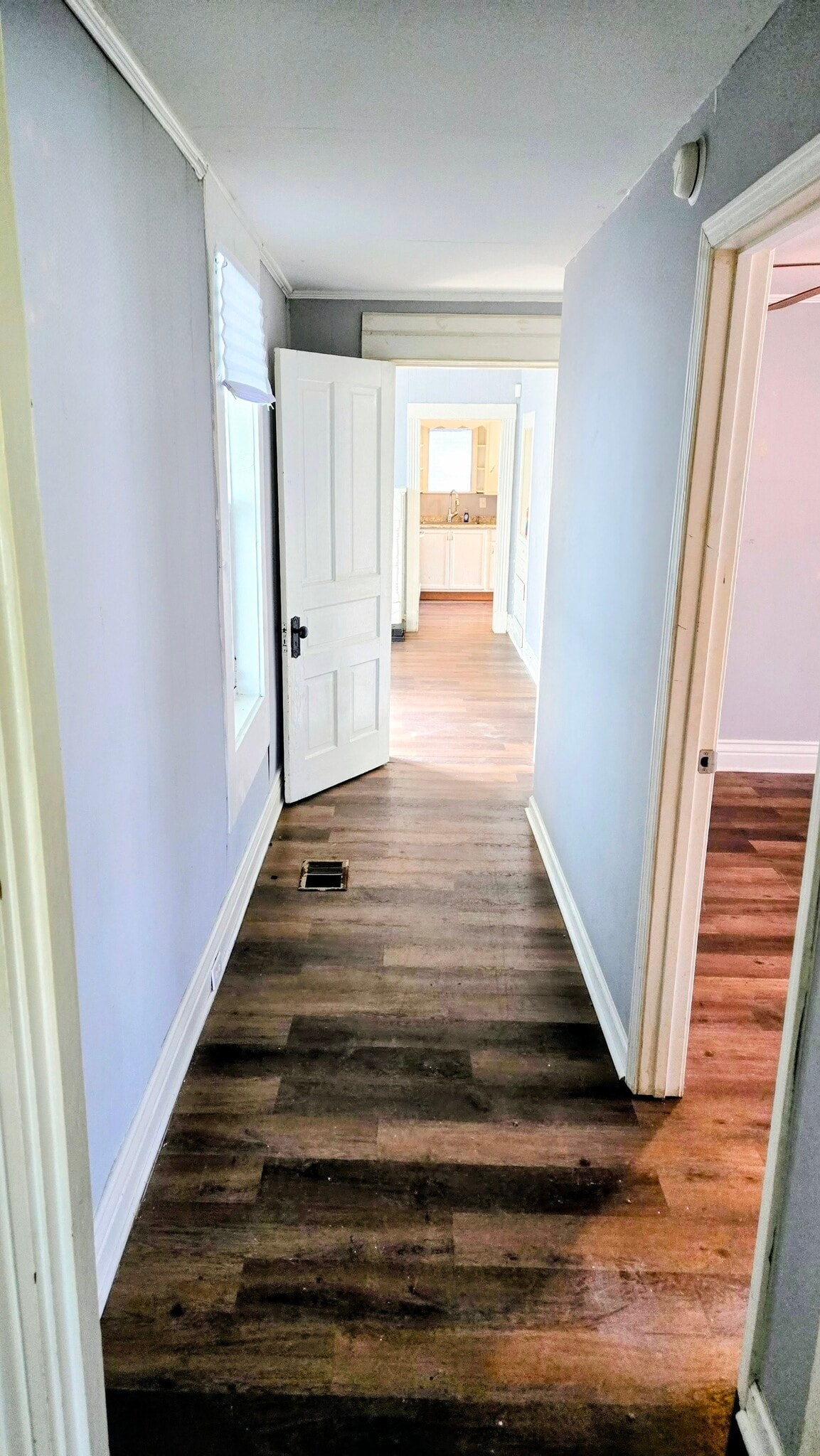 There is vinyl flooring throughout the house - 3348 Bohannon Ave
