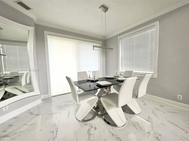 Building Photo - 3 br, 2.5 bath House - 8910 NW 45th Ct # 0