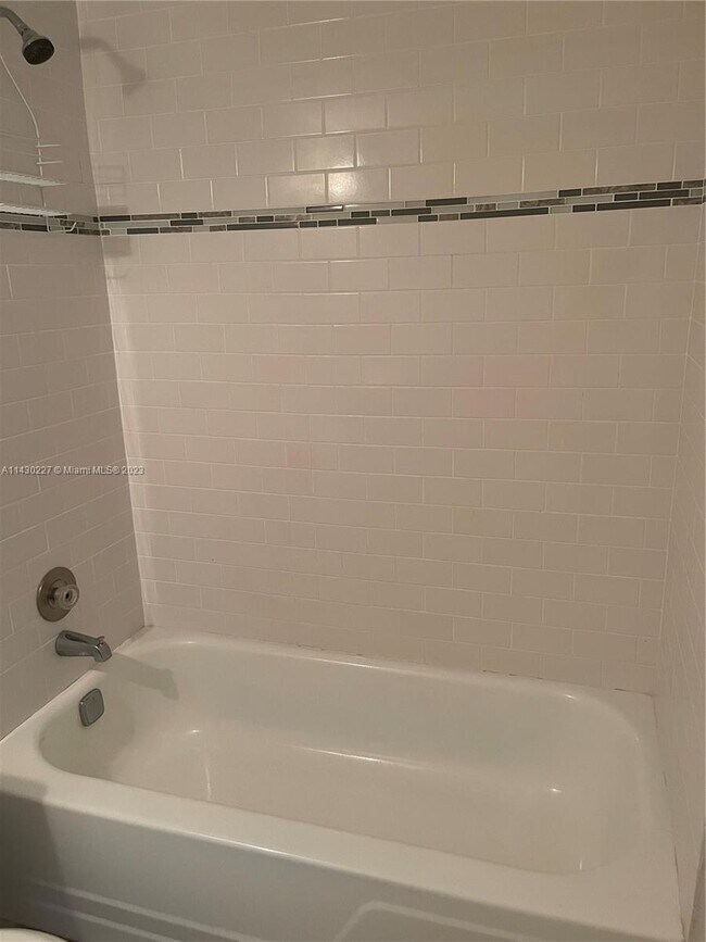 Building Photo - 8285 Sunrise Lakes Blvd