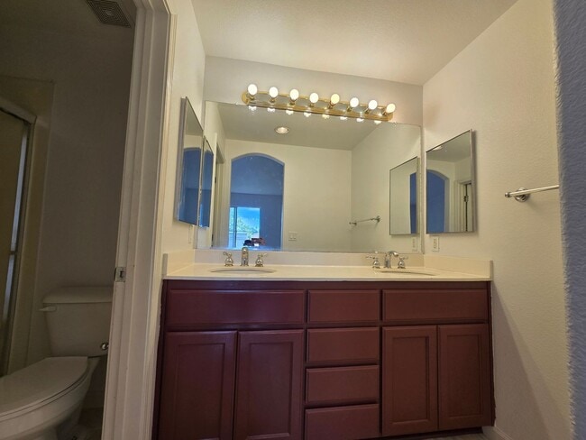 Building Photo - Beautifully Remodeled Tri Story Home located in a Gated Community ...
