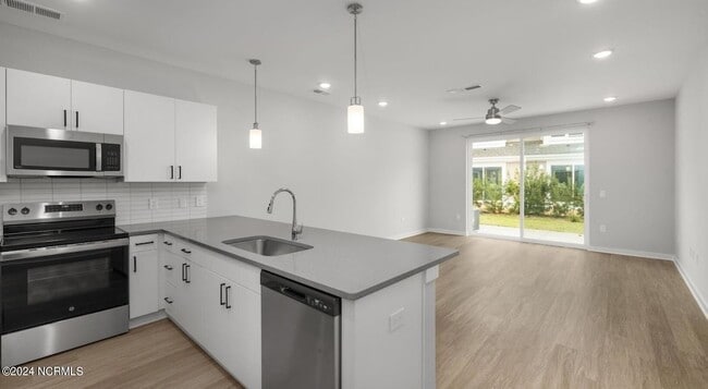 Building Photo - 8067 Purchase Ne Pl