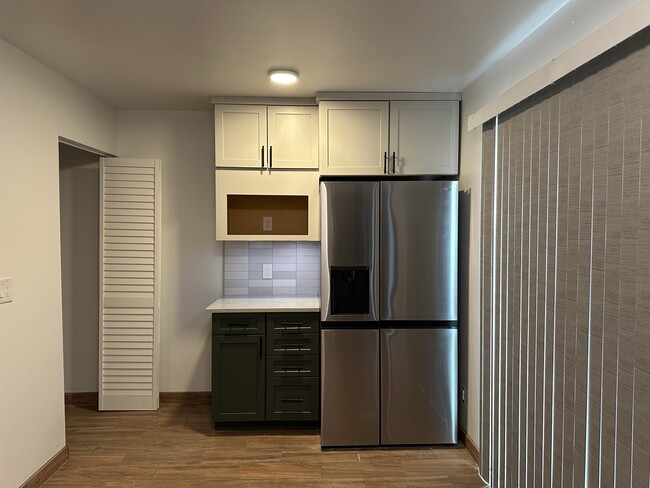 New Vertical Blinds and Tile Backsplash - 2950 N Alvernon Way