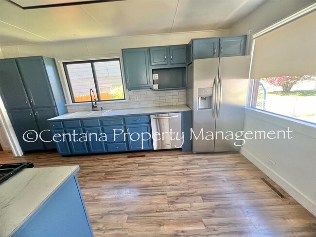 Building Photo - Remodeled 2 bedroom house on the flats with a garage, fenced yard, storage, and so much more!