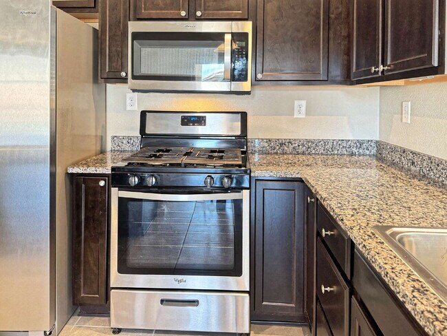 Building Photo - Only 4 years new!