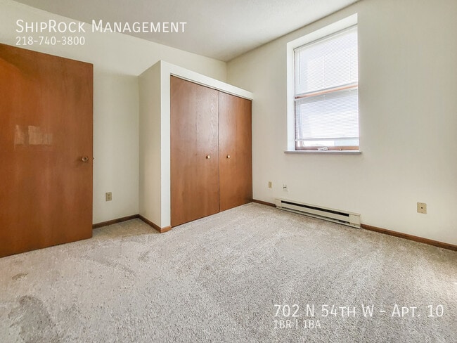Building Photo - 702 N 54th Ave W