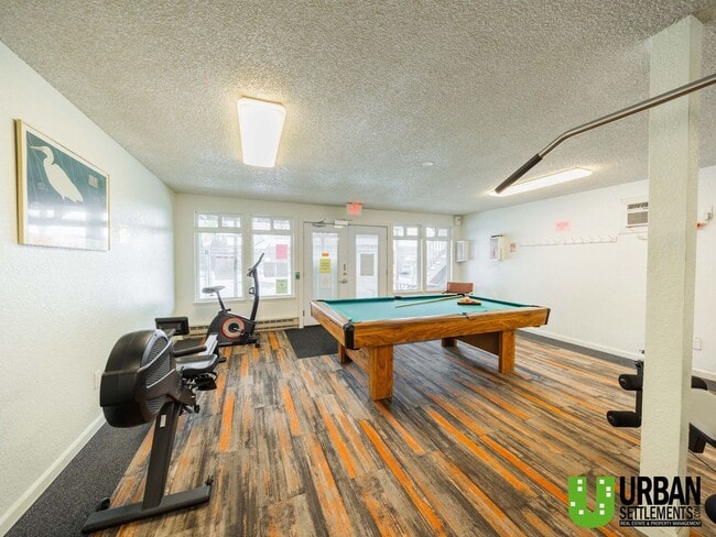 Building Photo - Comfortable 1-Bedroom Condo with Parking & Resort-Style Amenities