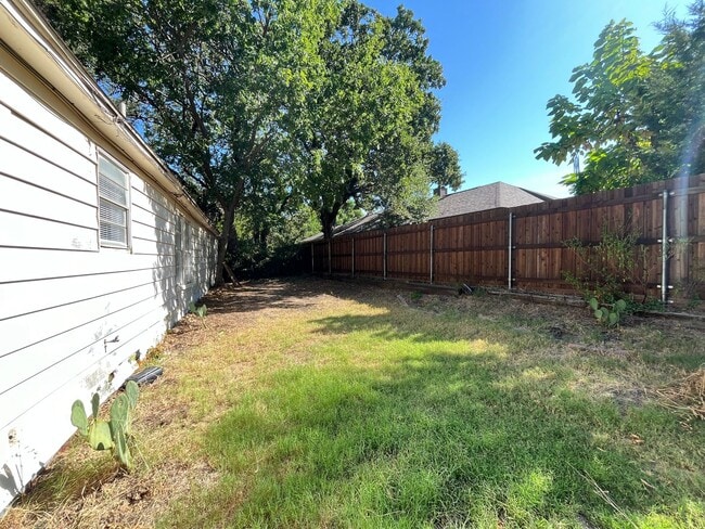 Building Photo - Denton Charmer with Big Yard, Carport & Flexible Living Space