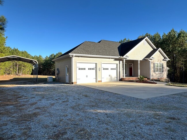 Building Photo - Lovely Custom Built Home with 2 Car Garage...