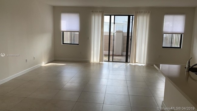 Building Photo - 6175 NW 104th Ct