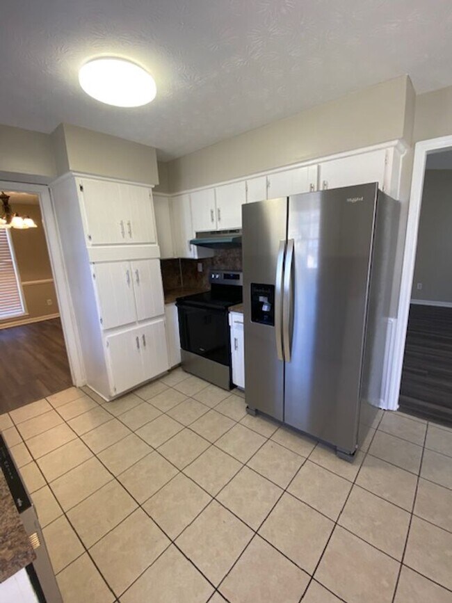 Building Photo - A Quiet Location, $200 Move-N-Special