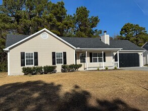 Building Photo - Charming 3 bedroom home in the Hubert area