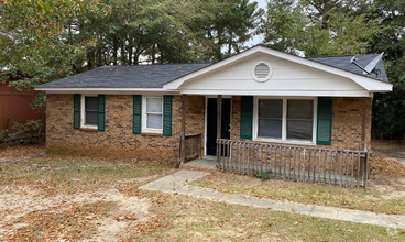 Building Photo - Four-bedroom house off North Main