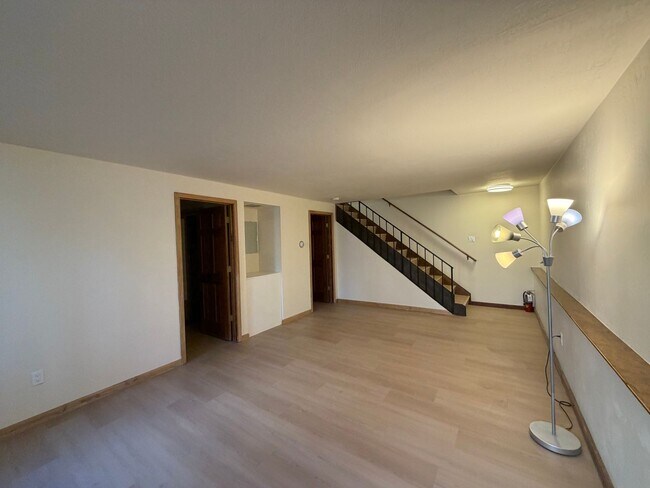 Building Photo - 2 Bed + Huge Bonus Room -  new flooring, paint and kitchen!   Lake Village Condo w/Forest Views