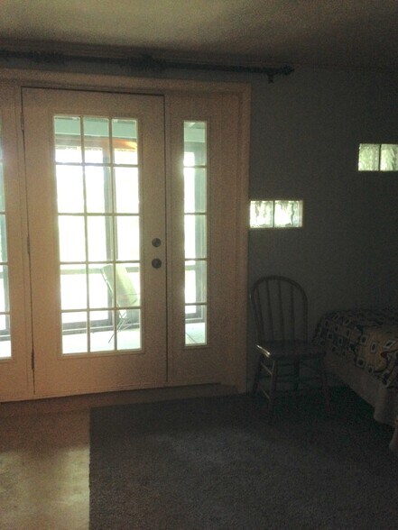 Windows and French door to screened porch. - 5309 N River Rd
