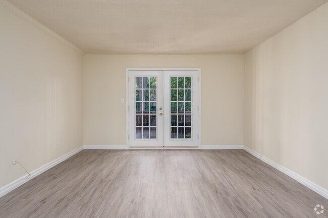 2BR, 1BA - 1,000SF - Living Room - Royal Springs Apartments