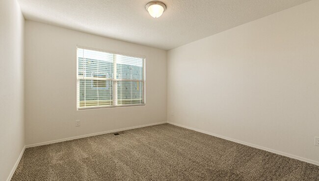 Building Photo - New ST FE Town Home