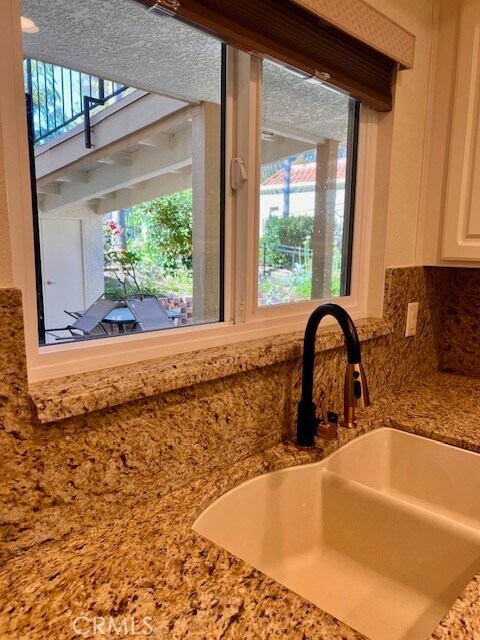 Building Photo - 5472 Paseo Del Lago E