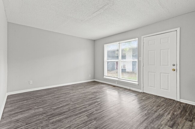 Building Photo - Summer Special! Updated 3BR Townhome with Basement + $250 Off First Month’s Rent