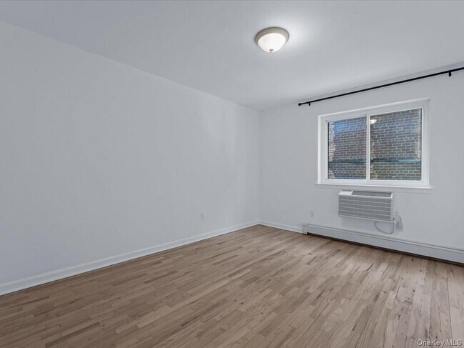 Building Photo - 214-16 40th Ave